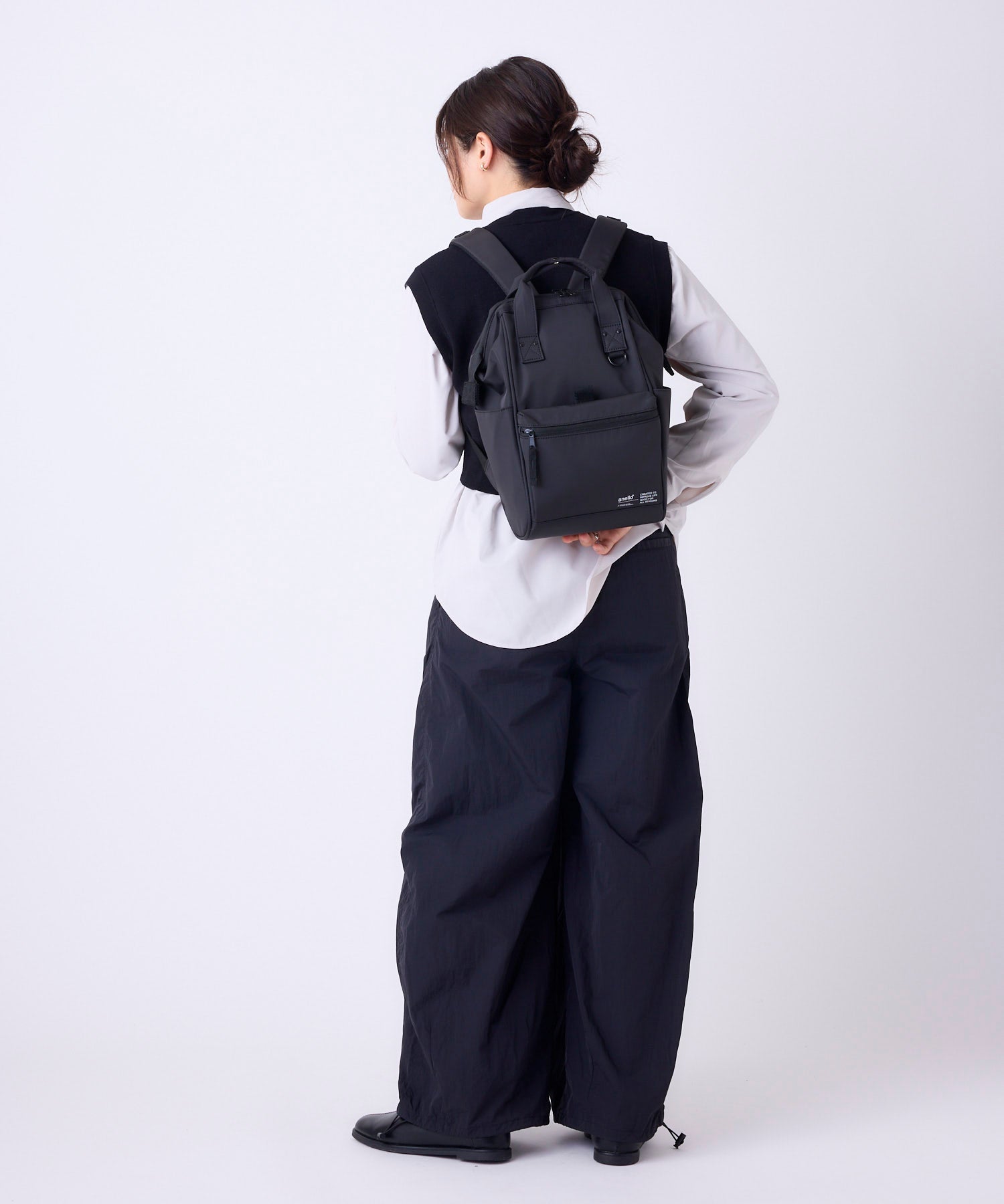 anello アネロ NATIVE CROSSBOTTLE 口金リュック A4 撥水 キャリーオンテープ PC収納可能 10L ATB5194 デリバー